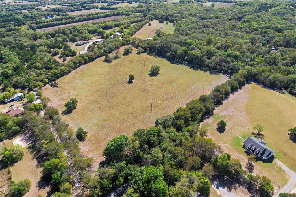 Tbd Wilson Road Whitewright, TX 75491 - Photo 11 of 16 an aerial view of a house with a yard and lake view