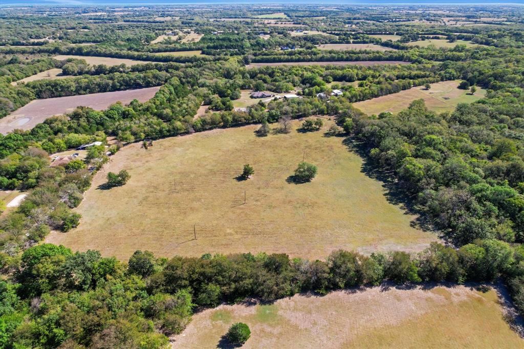 Tbd Wilson Road Whitewright, TX 75491 - Photo 10 of 16 an aerial view of lake residential house with swimming pool and green space