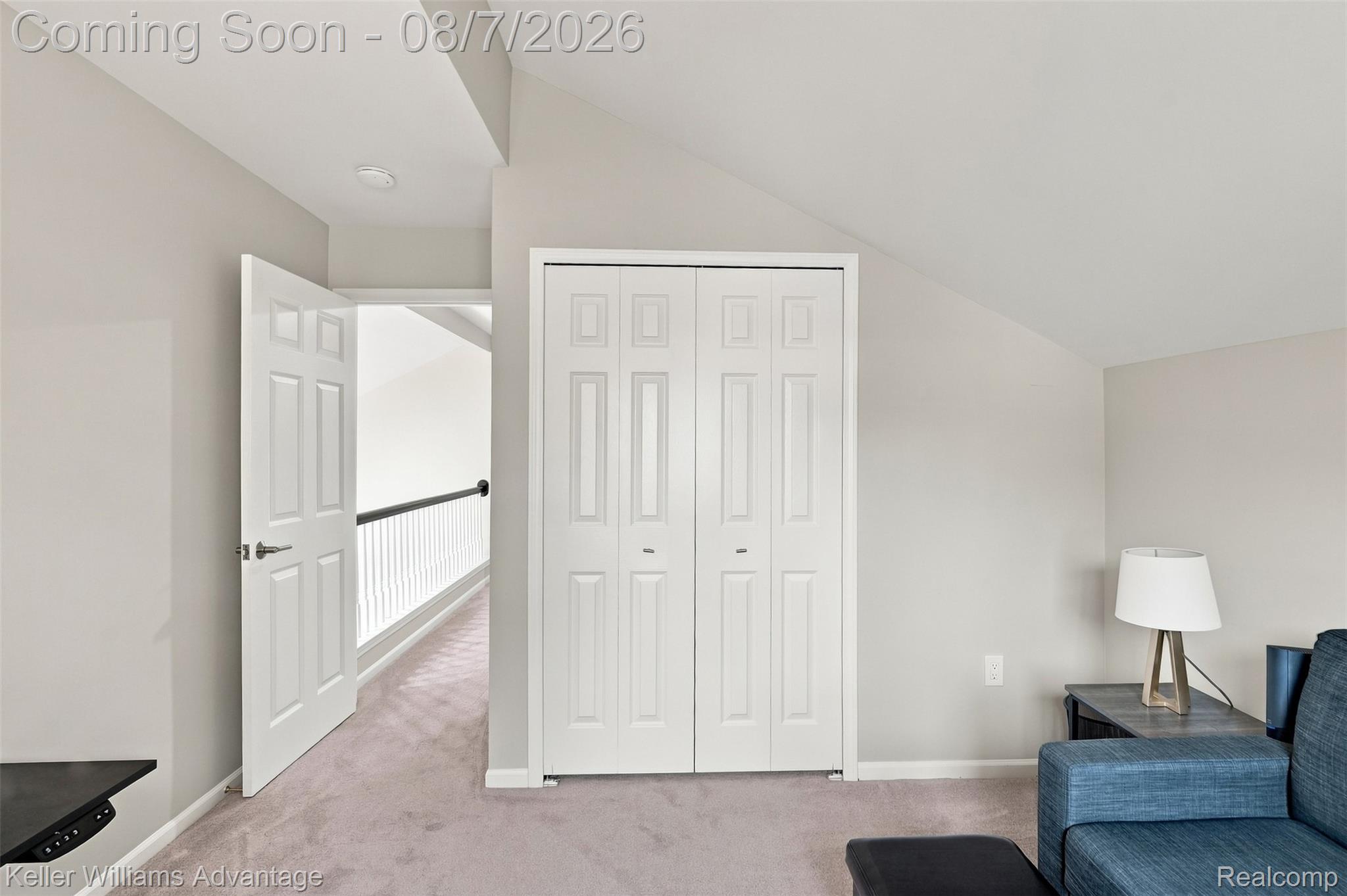 5325 Simpson Lake Road West Bloomfield, MI 48323 - Photo 21 of 43 Sloped ceiling architecture with recessed lighting, paneled interior doors, and carpet flooring