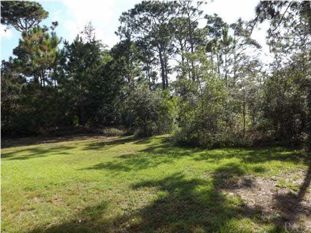 12469 Red Cloud Road Pensacola, FL 32507 - Photo 4 of 20 Nothing but green belt behind this home. Man will the kids love that!