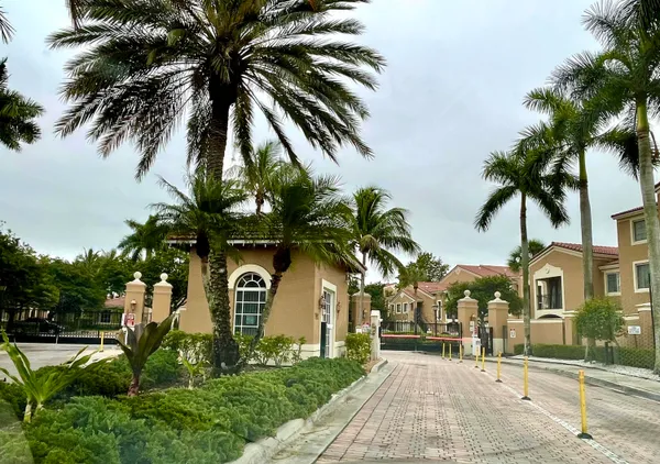 a front view of house with small garden
