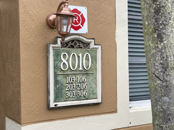 a sign that is on the side of a building