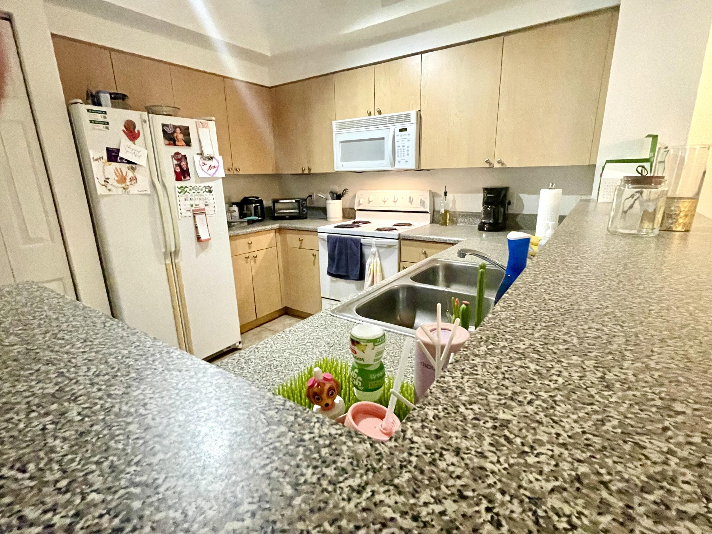 8010 North Nob Hill Road, Unit 106 Tamarac, FL 33321 - Photo 7 of 26 IMG_4281