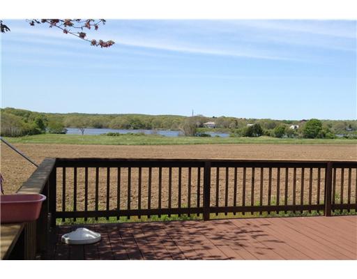 39 Southern Way Charlestown, RI 02813 - Photo 3 of 17 Patio/Deck. 450 square foot to enjoy the views and tranquil setting over looking nature conservacy land. so....peaceful!!