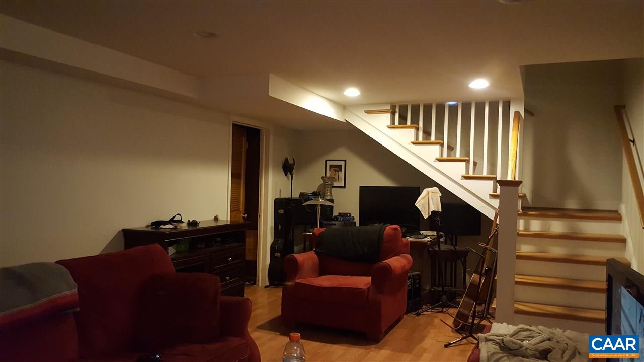 111 Apple Tree Road Charlottesville, VA 22903 - Photo 13 of 19 a living room with furniture and stairs