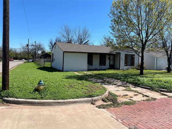 a front view of house with yard