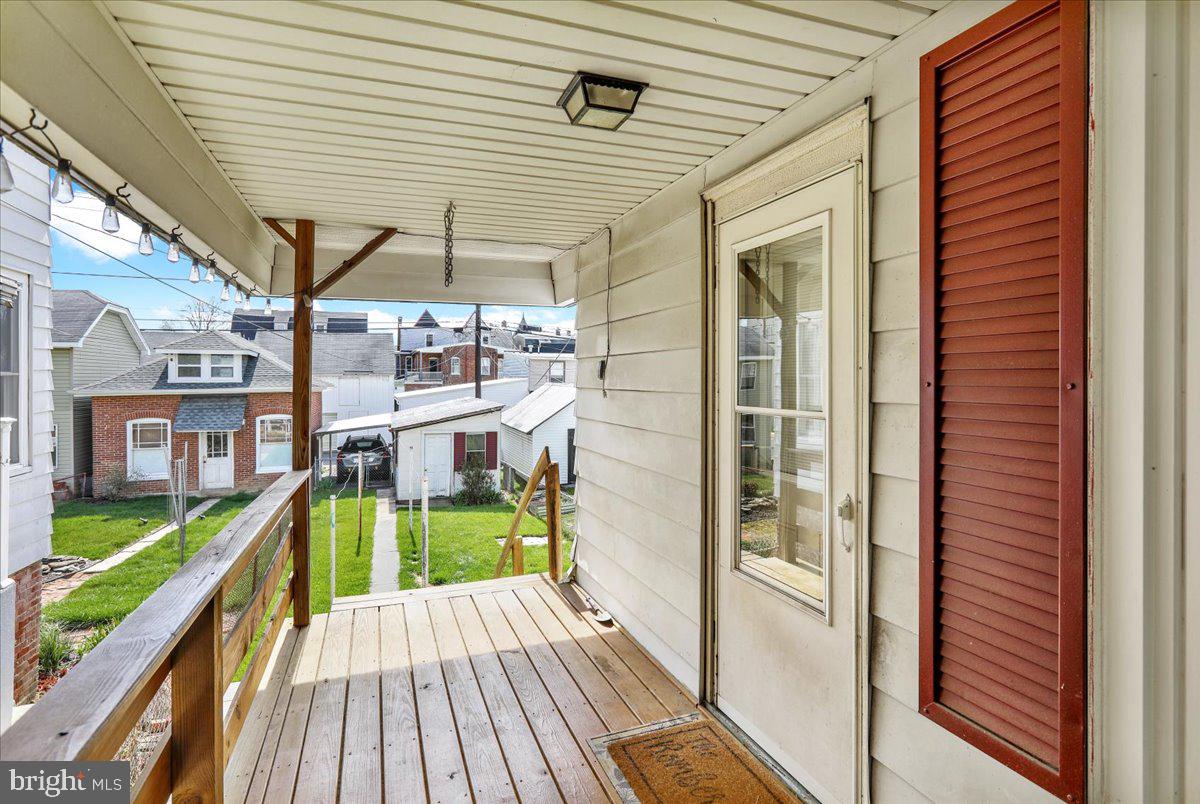 258 East Walnut Street Kutztown, PA 19530 - Photo 22 of 30 a view of balcony with a large window and wooden floor