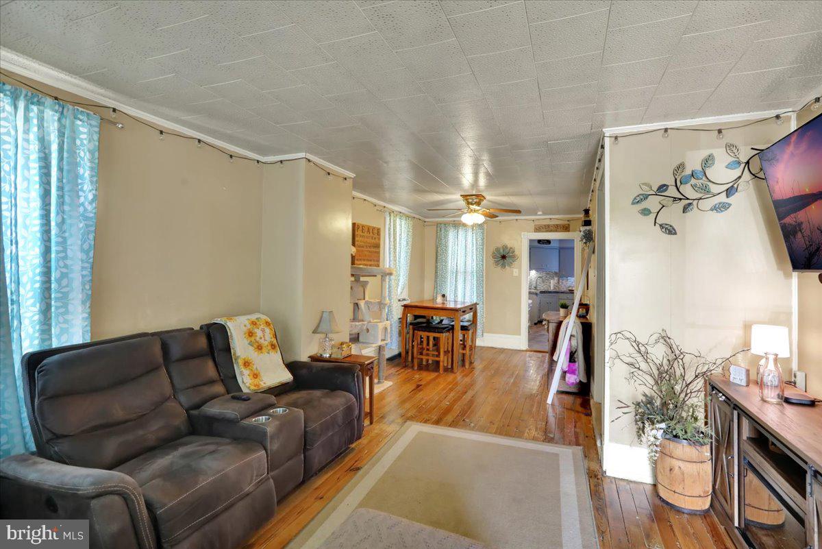 258 East Walnut Street Kutztown, PA 19530 - Photo 5 of 30 a living room with furniture and a couch