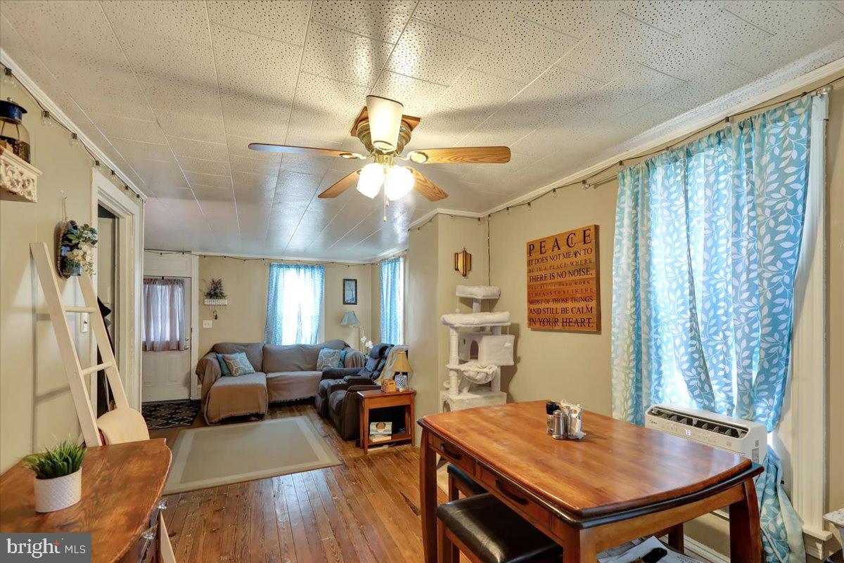258 East Walnut Street Kutztown, PA 19530 - Photo 7 of 30 a view of a dining room with furniture window and wooden floor