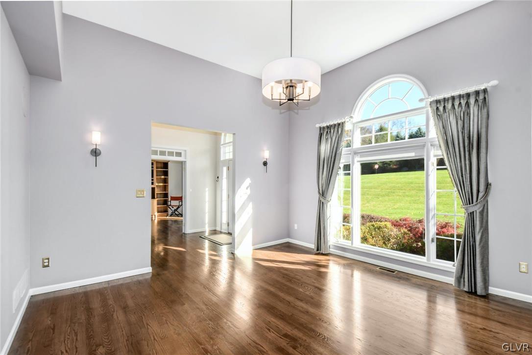 10 Barron Hill Road Easton, PA 18042 - Photo 14 of 35 a view of an empty room with wooden floor and a window