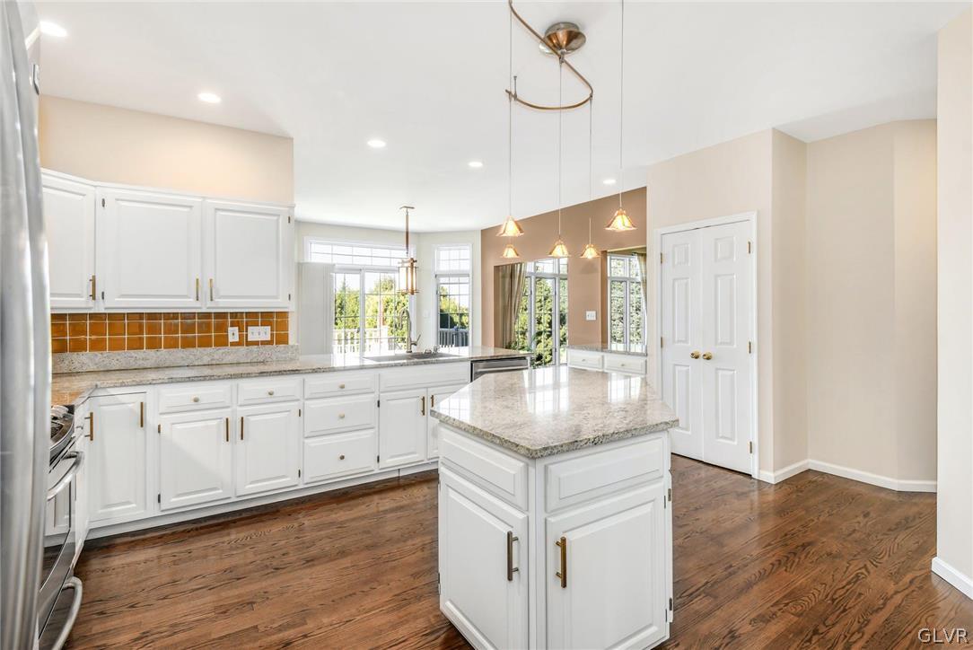 10 Barron Hill Road Easton, PA 18042 - Photo 17 of 35 a kitchen with granite countertop white cabinets and white appliances