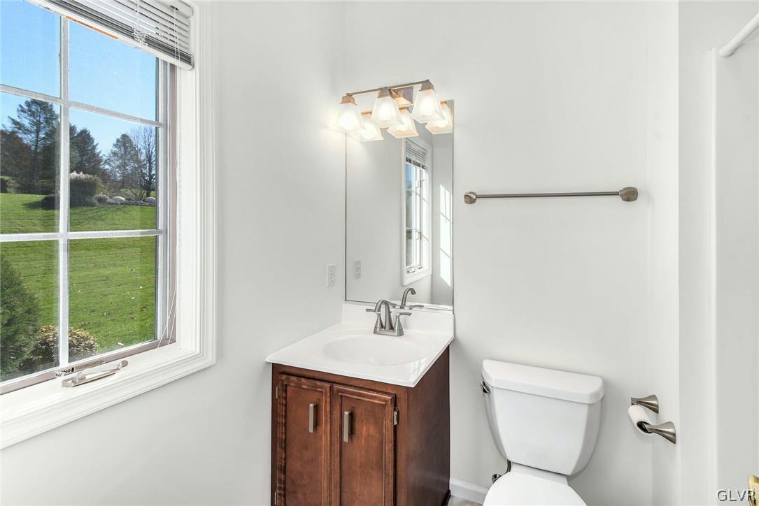 10 Barron Hill Road Easton, PA 18042 - Photo 24 of 35 a bathroom with a toilet sink and mirror