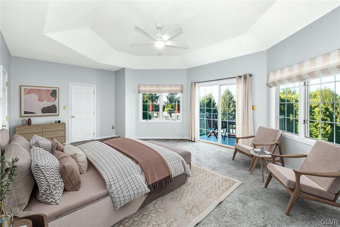 10 Barron Hill Road Easton, PA 18042 - Photo 9 of 35 a spacious bedroom with a large bed and a large window