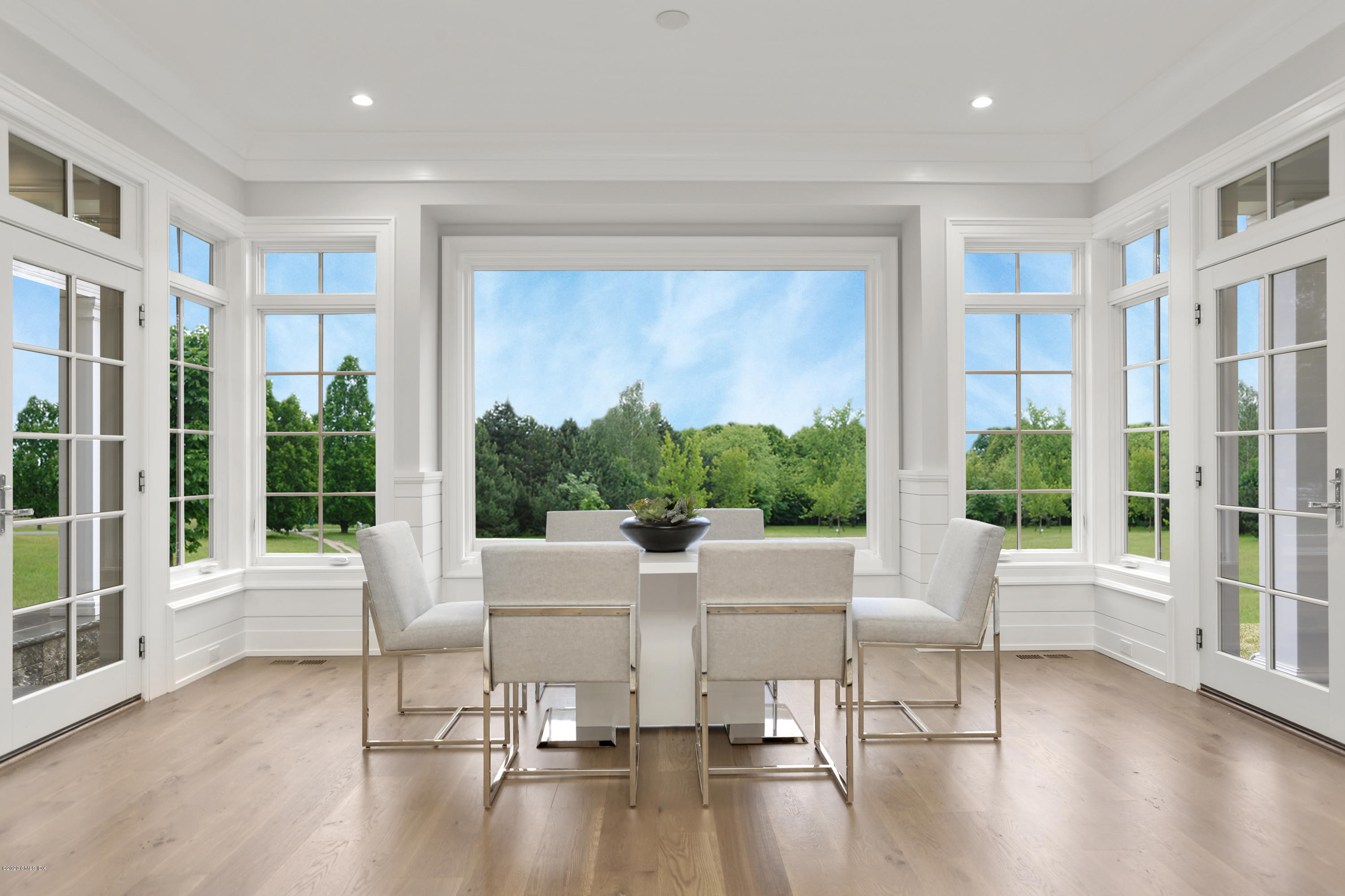 498 Lake Avenue Greenwich, CT 06830 - Photo 17 of 37 a living room with furniture and a large window