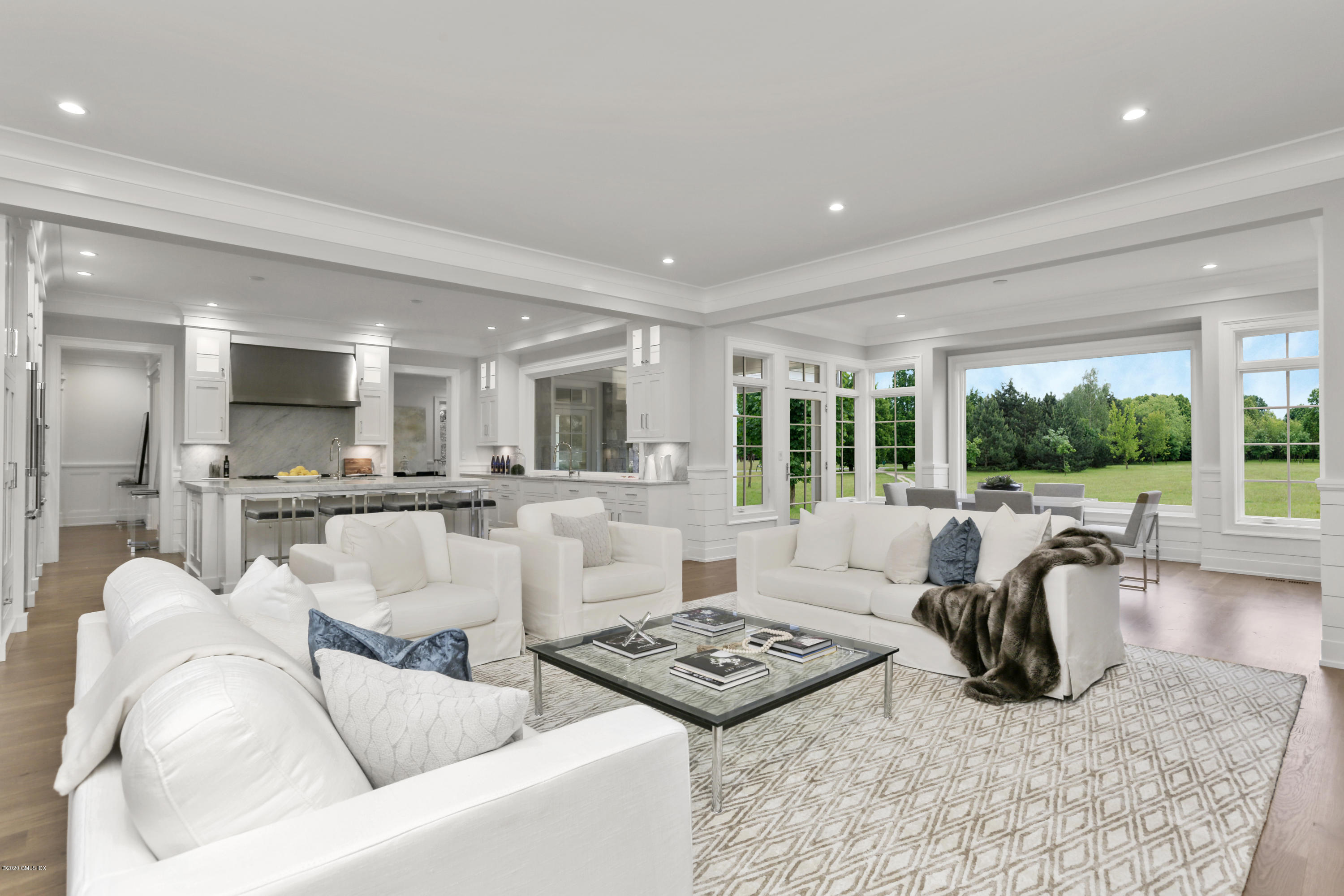 498 Lake Avenue Greenwich, CT 06830 - Photo 18 of 37 a living room with furniture and a large window