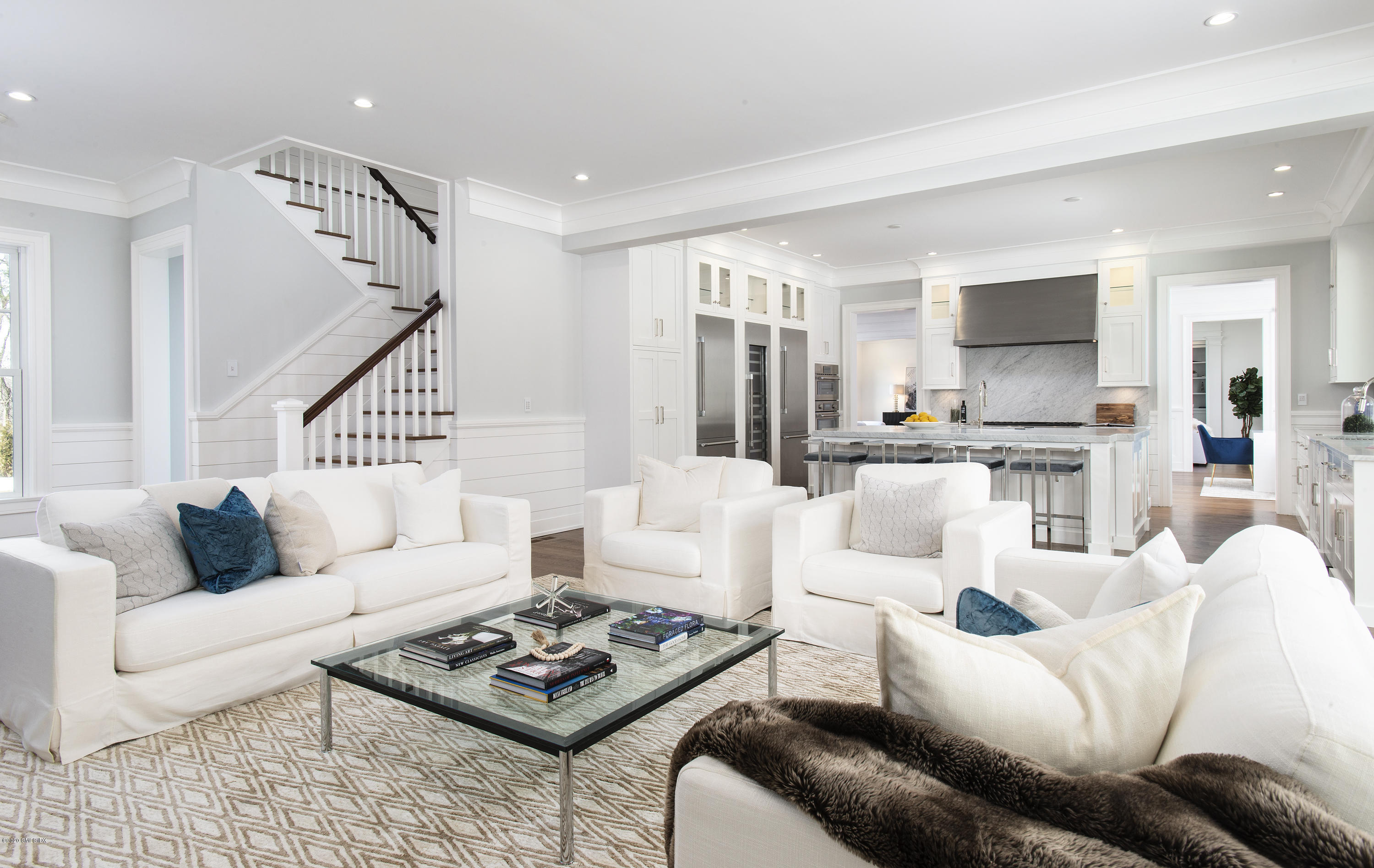 498 Lake Avenue Greenwich, CT 06830 - Photo 21 of 37 a living room with furniture and a wooden floor