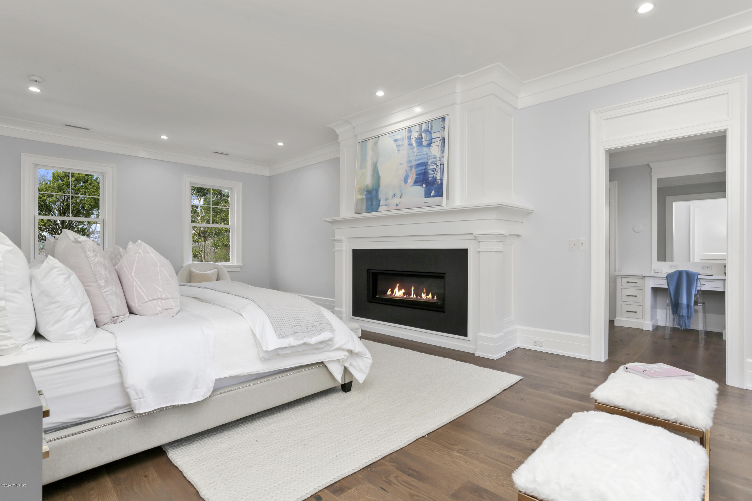 498 Lake Avenue Greenwich, CT 06830 - Photo 27 of 37 a bedroom with a bed and a couch