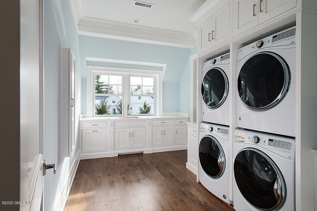 498 Lake Avenue Greenwich, CT 06830 - Photo 32 of 37 a view of entryway with washer and dryer
