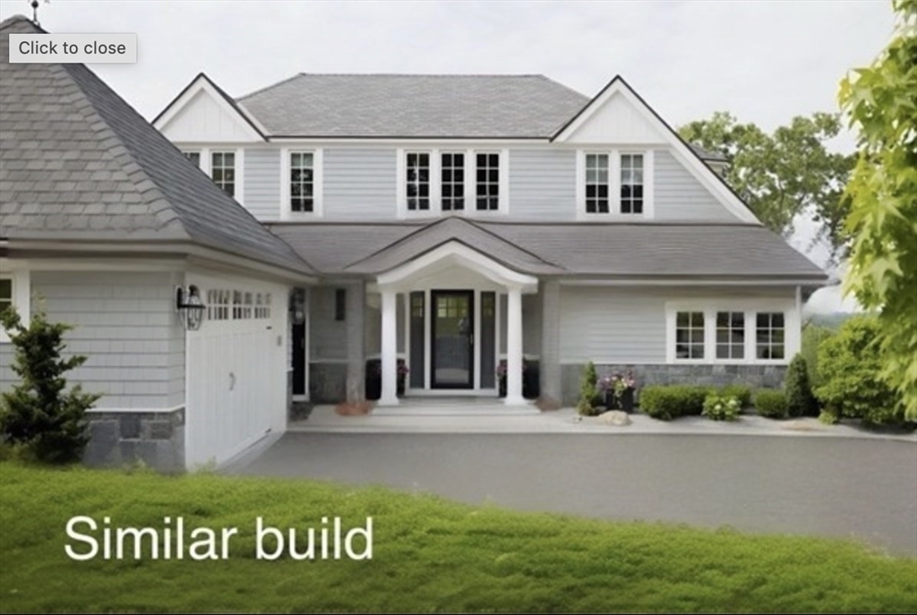 38 Buttonwood, Unit 30 Ipswich, MA 01938 - Photo 7 of 9 a front view of a house with garden