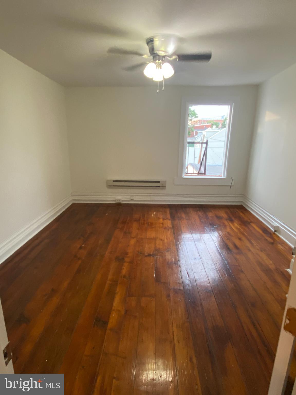 260 Verbeke Street Harrisburg, PA 17102 - Photo 16 of 20 Bright, airy room with polished wood floors.