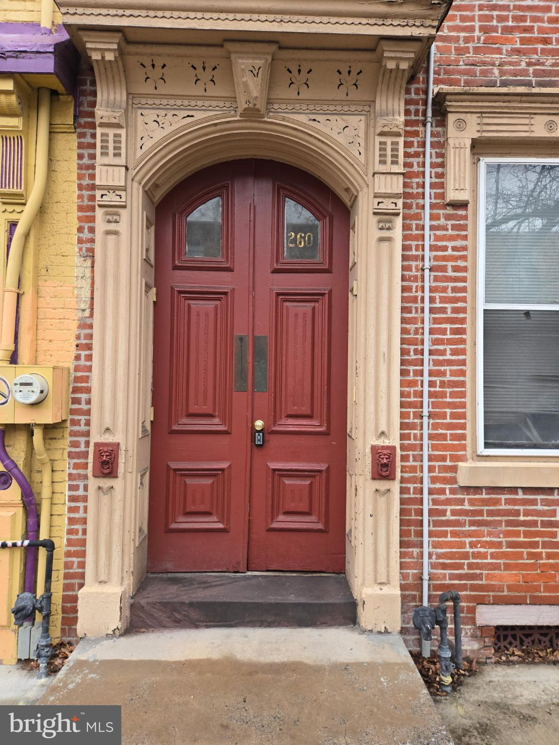 260 Verbeke Street Harrisburg, PA 17102 - Photo 20 of 20 Elegant red door with intricate details.