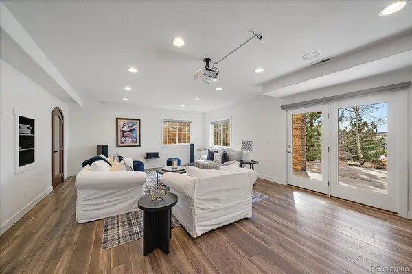 a living room with furniture or window and a flat screen tv