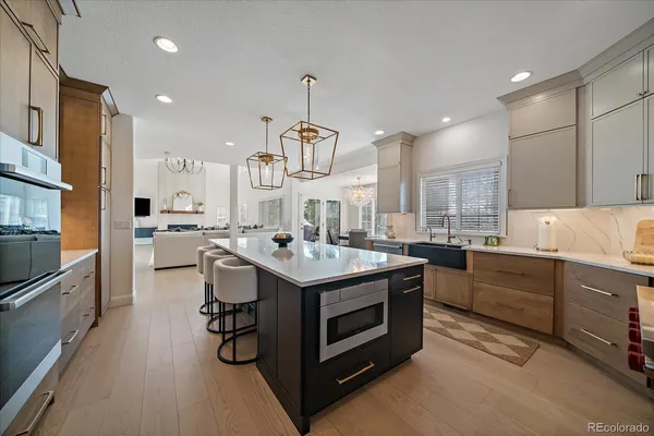 a kitchen with a stove and a sink