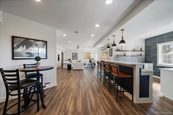 a bedroom with a bed and a potted plant