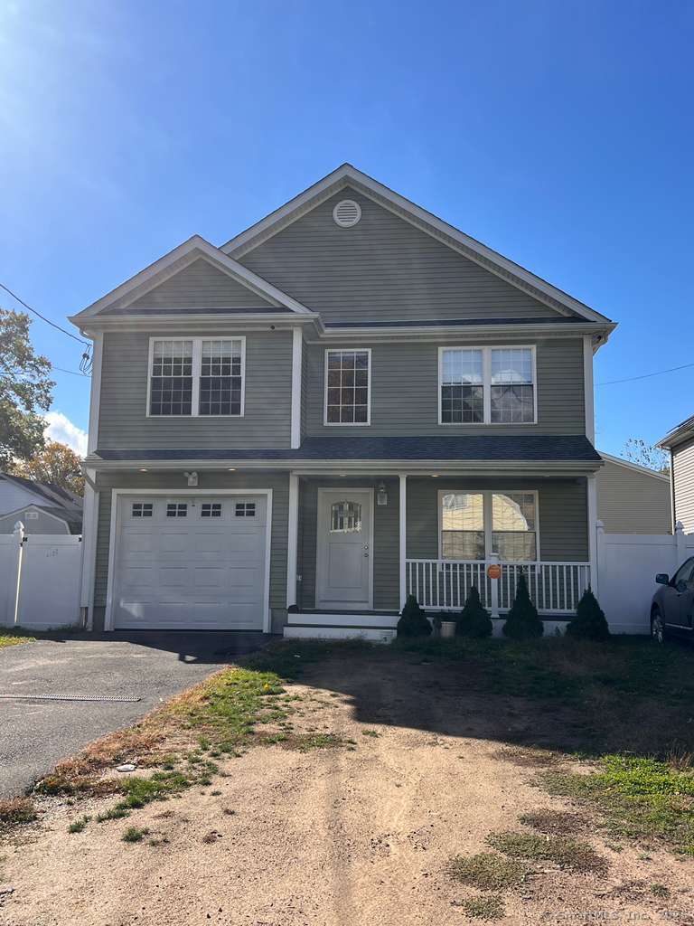 793 Pond Street Bridgeport, CT 06606 - Photo 1 of 28 a front view of a house
