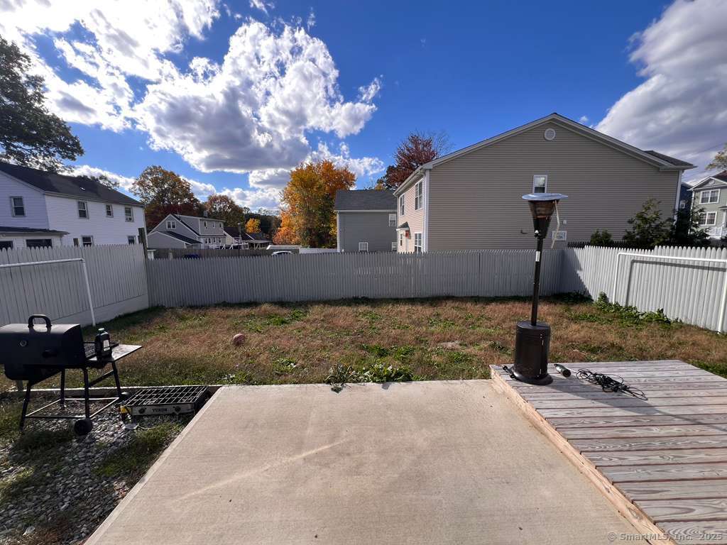 793 Pond Street Bridgeport, CT 06606 - Photo 28 of 28 a front view of a house with garden