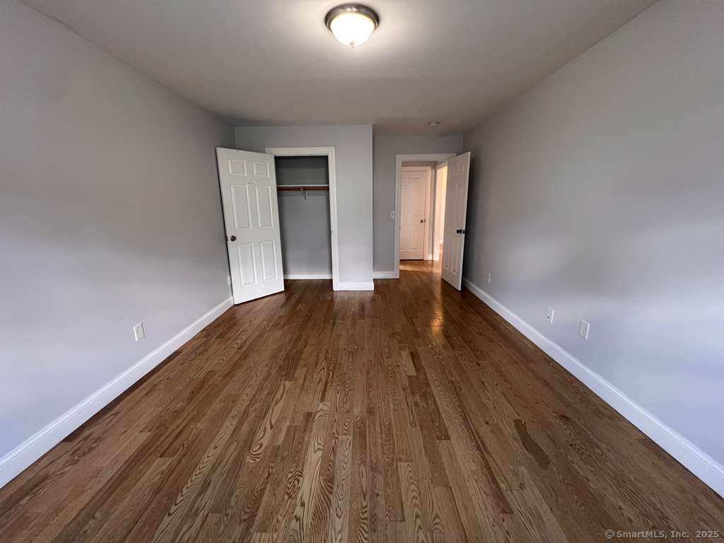 793 Pond Street Bridgeport, CT 06606 - Photo 10 of 28 a view of an empty room and window