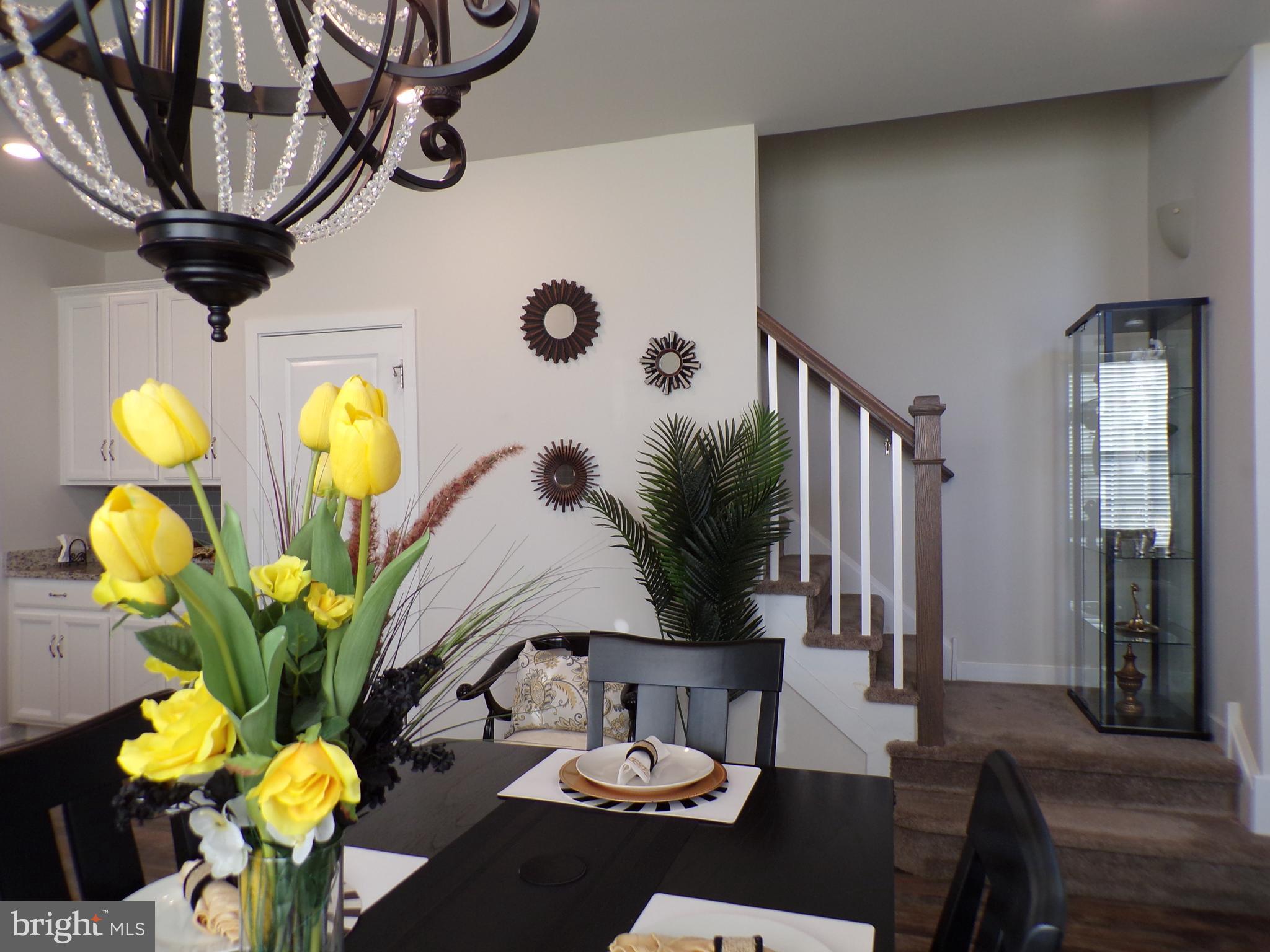 51 Bridge Boulevard Mount Holly, NJ 08060 - Photo 13 of 74 a view of a dining room with furniture and chandelier