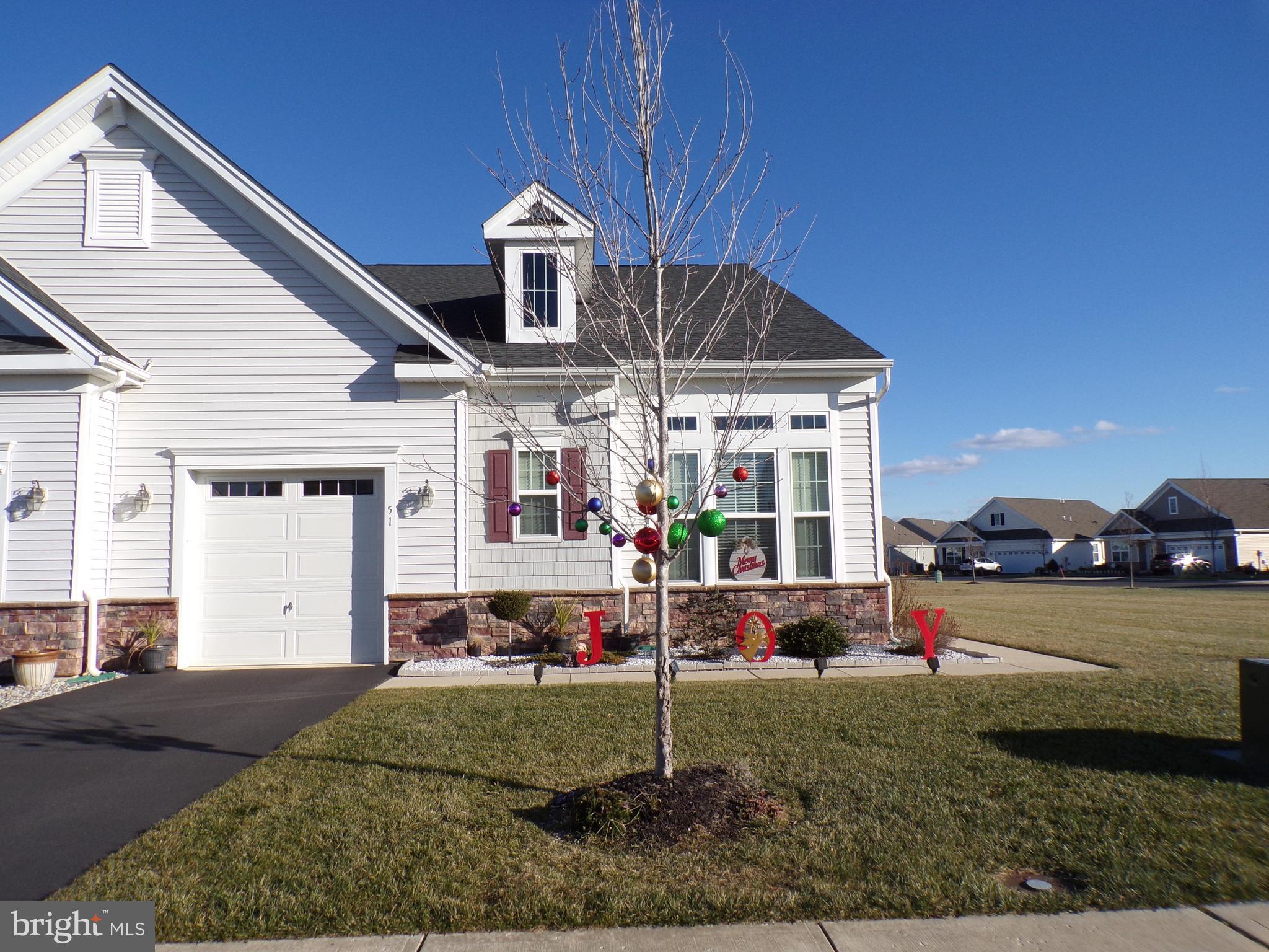 51 Bridge Boulevard Mount Holly, NJ 08060 - Photo 2 of 74 a front view of a house with a yard and garage