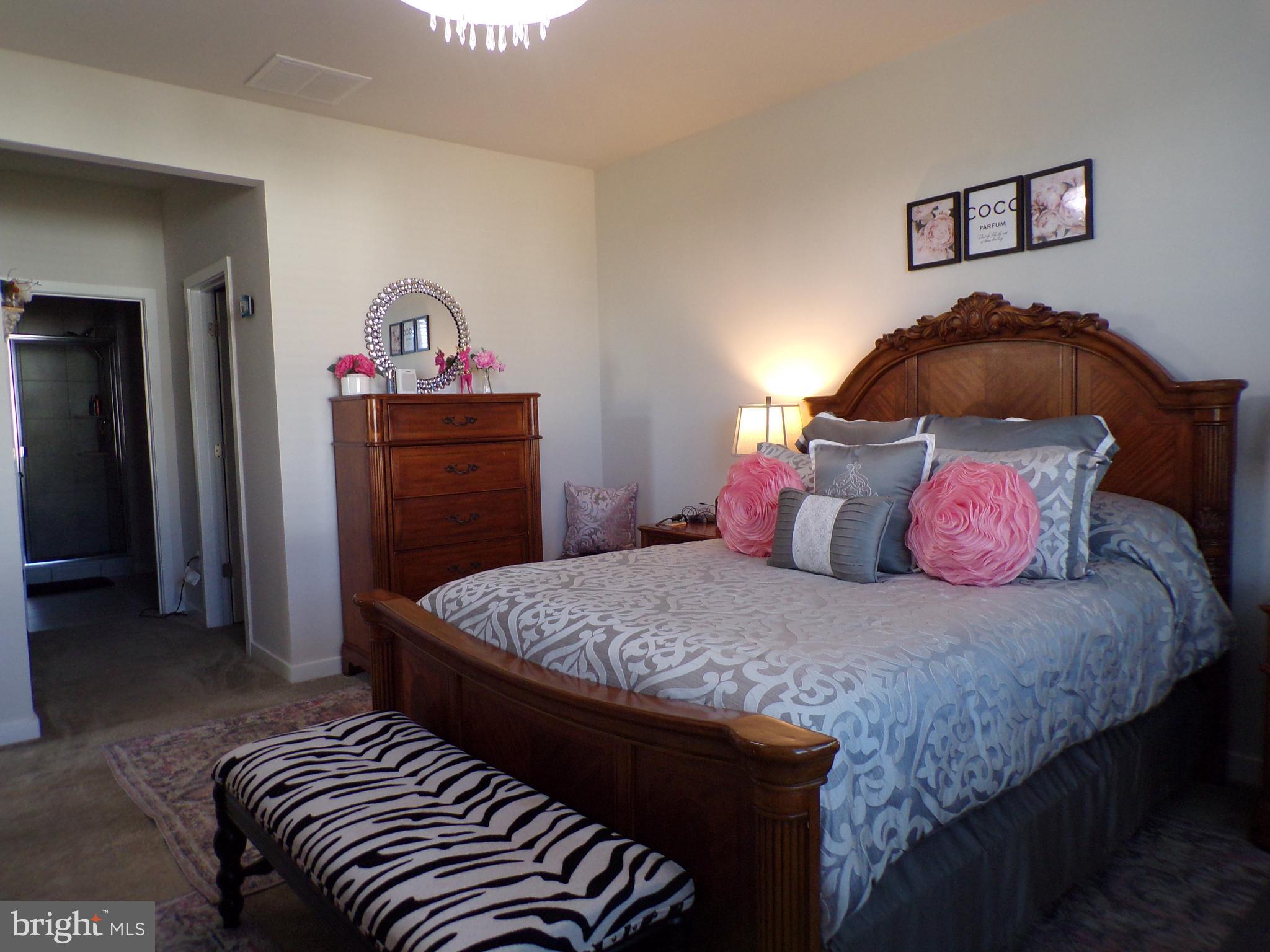 51 Bridge Boulevard Mount Holly, NJ 08060 - Photo 19 of 74 a bedroom with a bed and a dresser