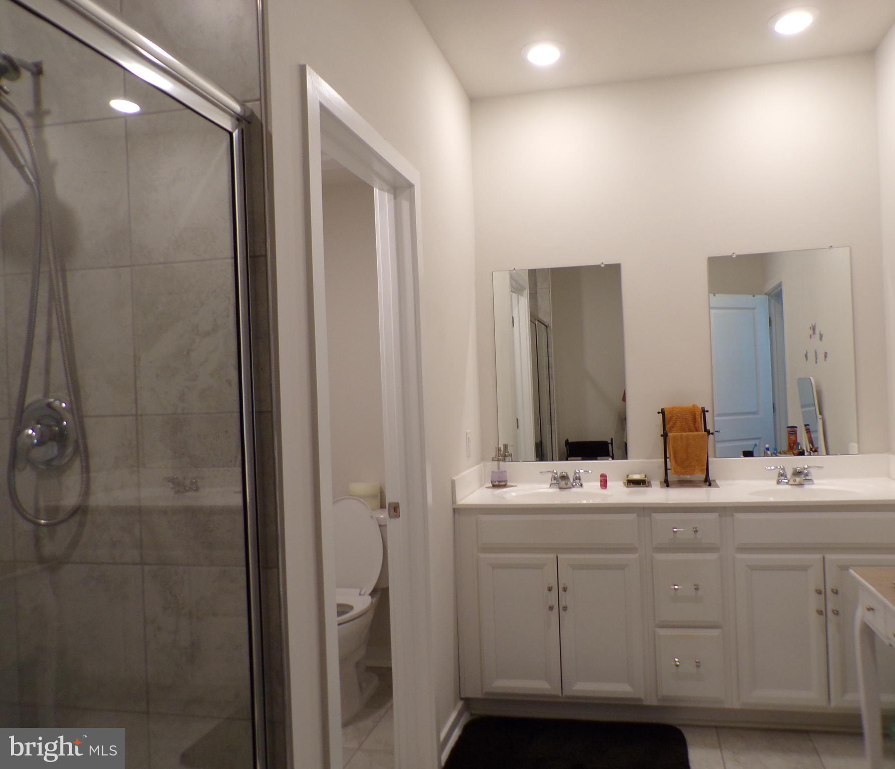 51 Bridge Boulevard Mount Holly, NJ 08060 - Photo 23 of 74 a bathroom with a double vanity sink mirror and double