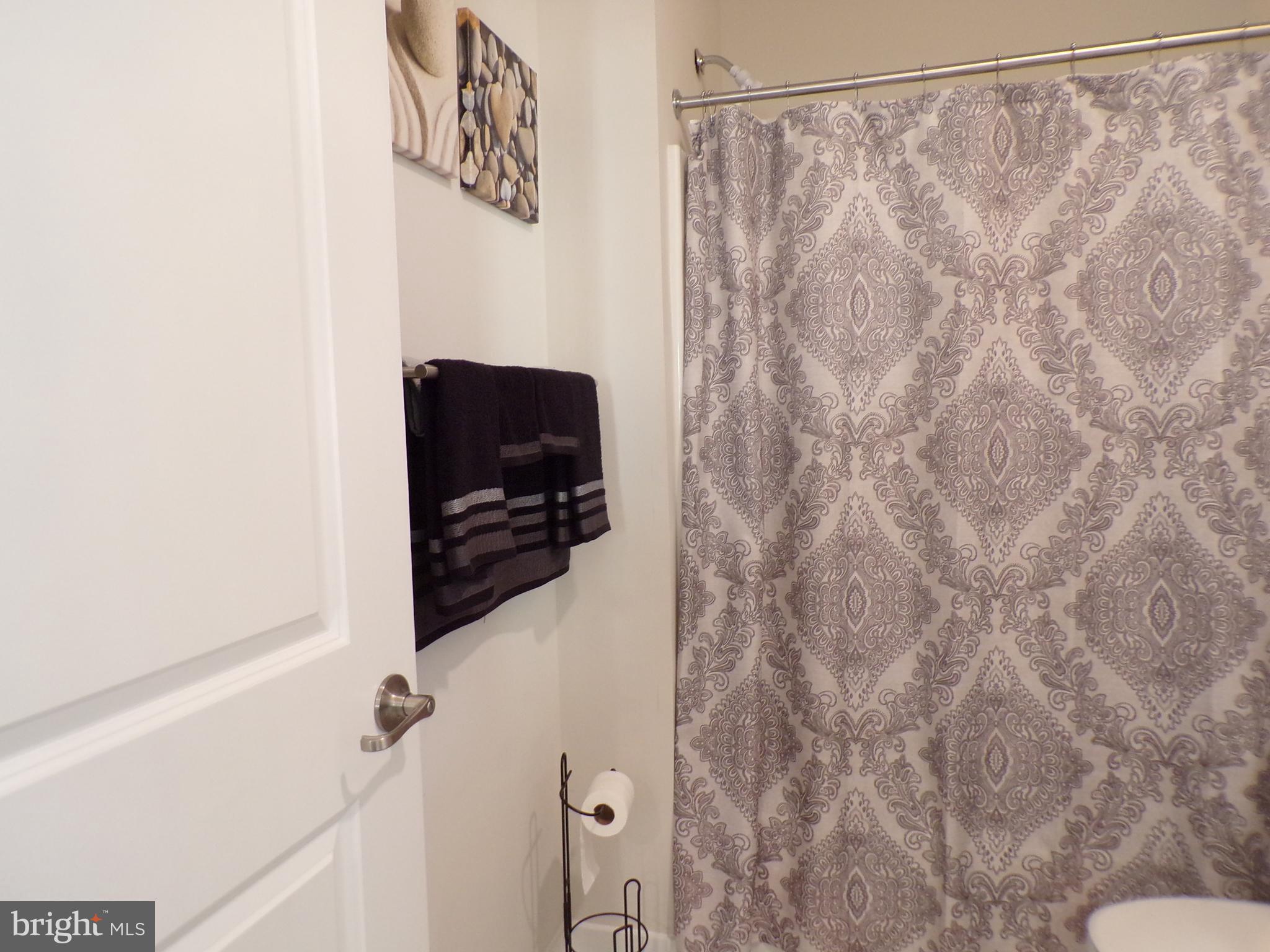 51 Bridge Boulevard Mount Holly, NJ 08060 - Photo 28 of 74 a bathroom with a shower and a sink