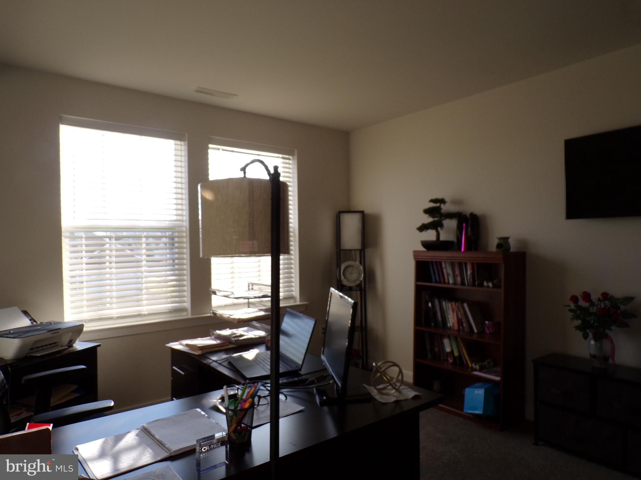 51 Bridge Boulevard Mount Holly, NJ 08060 - Photo 31 of 74 a view of a workspace with furniture and a window