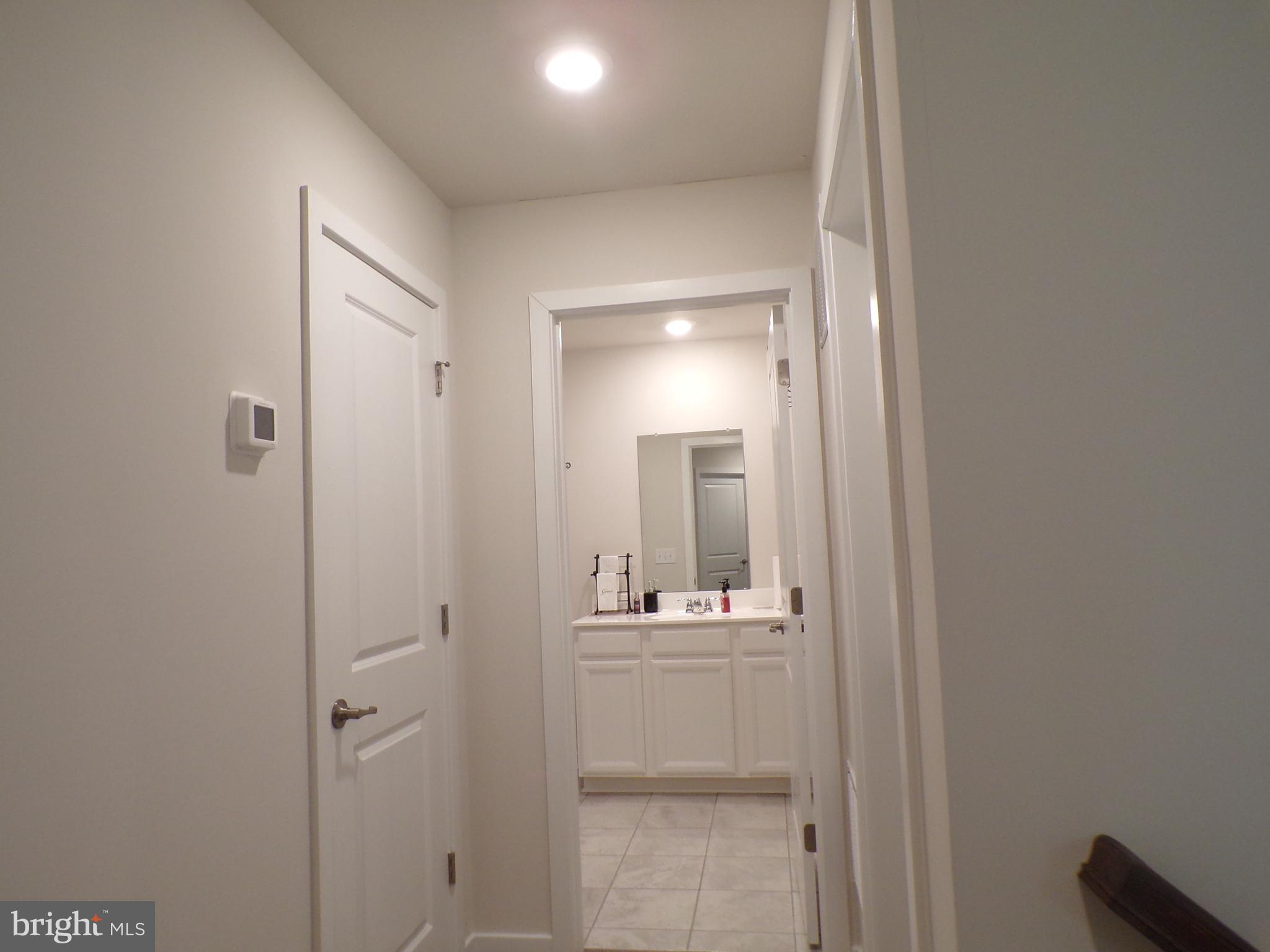 51 Bridge Boulevard Mount Holly, NJ 08060 - Photo 38 of 74 a bathroom with a sink and mirror