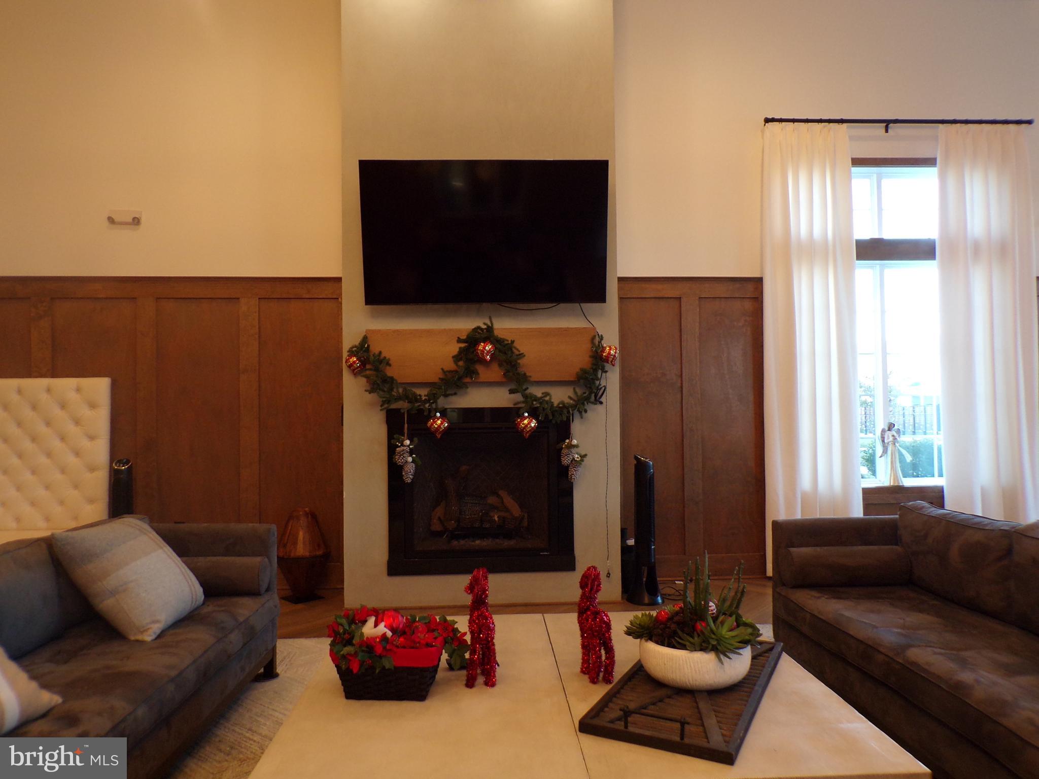 51 Bridge Boulevard Mount Holly, NJ 08060 - Photo 57 of 74 a living room with furniture and a flat screen tv