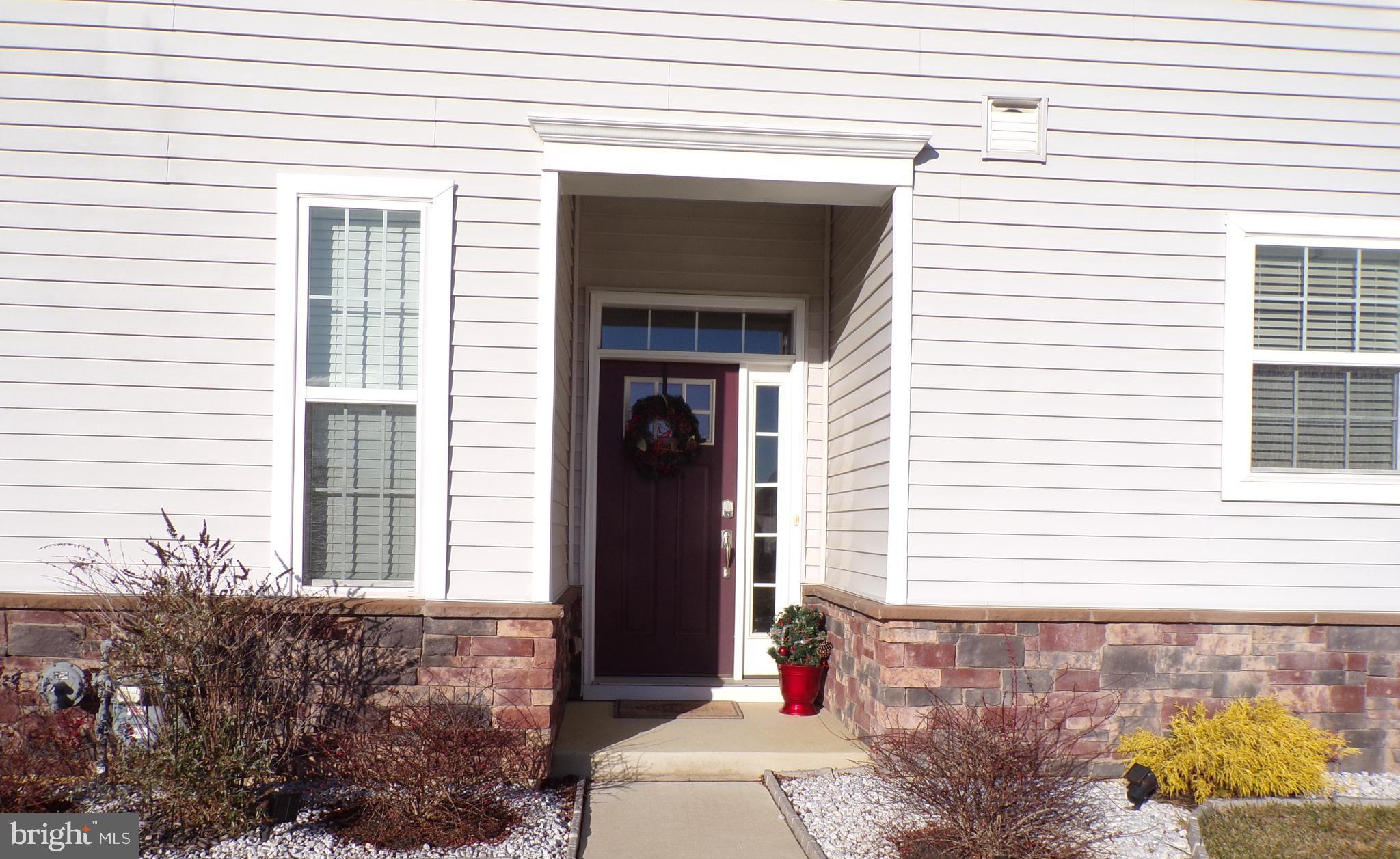 51 Bridge Boulevard Mount Holly, NJ 08060 - Photo 6 of 74 a front view of a house with a yard