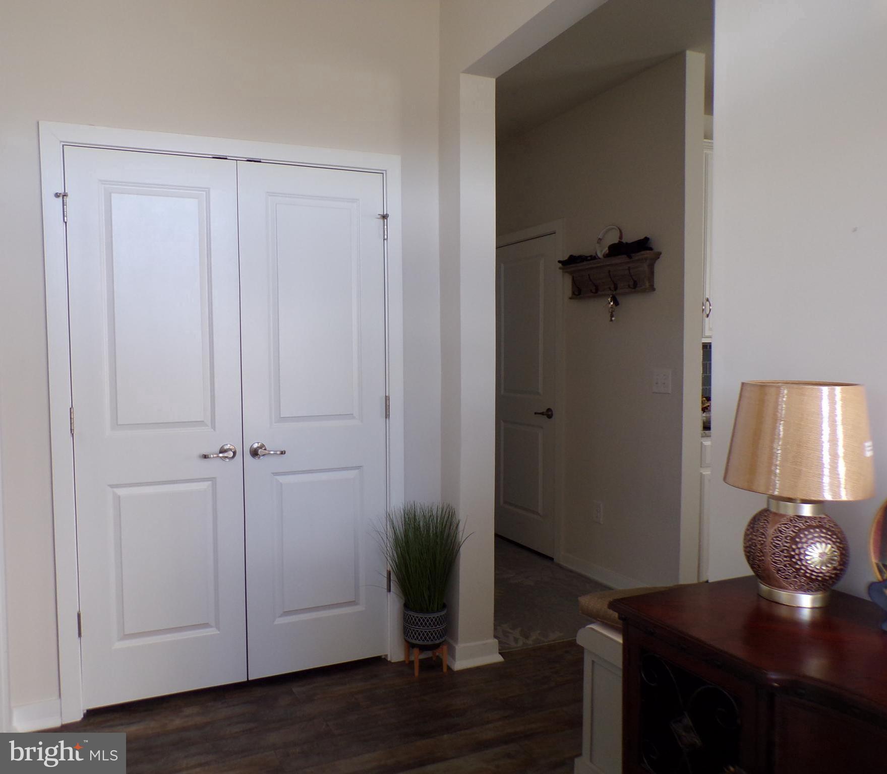 51 Bridge Boulevard Mount Holly, NJ 08060 - Photo 7 of 74 a view of a bathroom with a potted plant on the counter