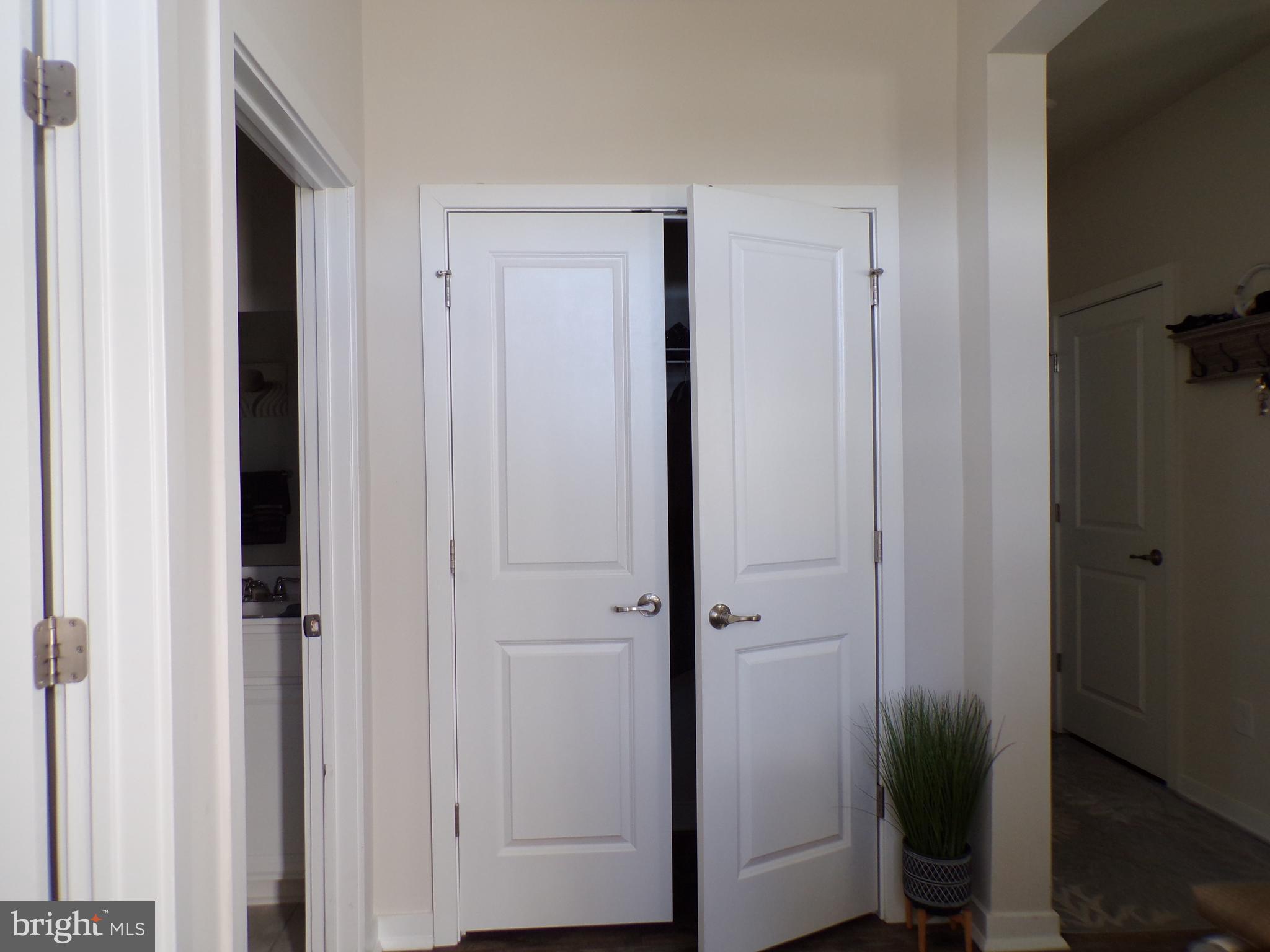 51 Bridge Boulevard Mount Holly, NJ 08060 - Photo 8 of 74 a view of a hallway with potted plant
