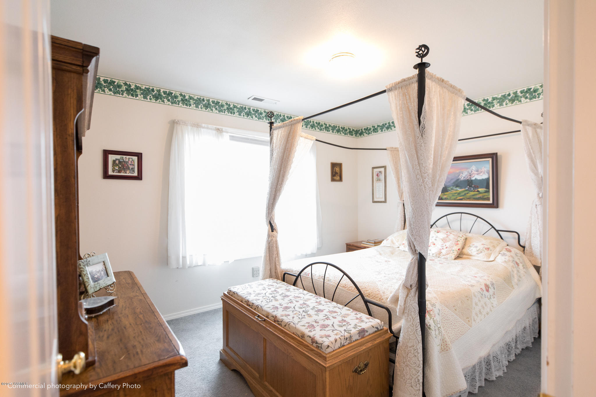 601 Hancock Road Cowiche, WA 98923 - Photo 12 of 28 a bedroom with furniture and a window