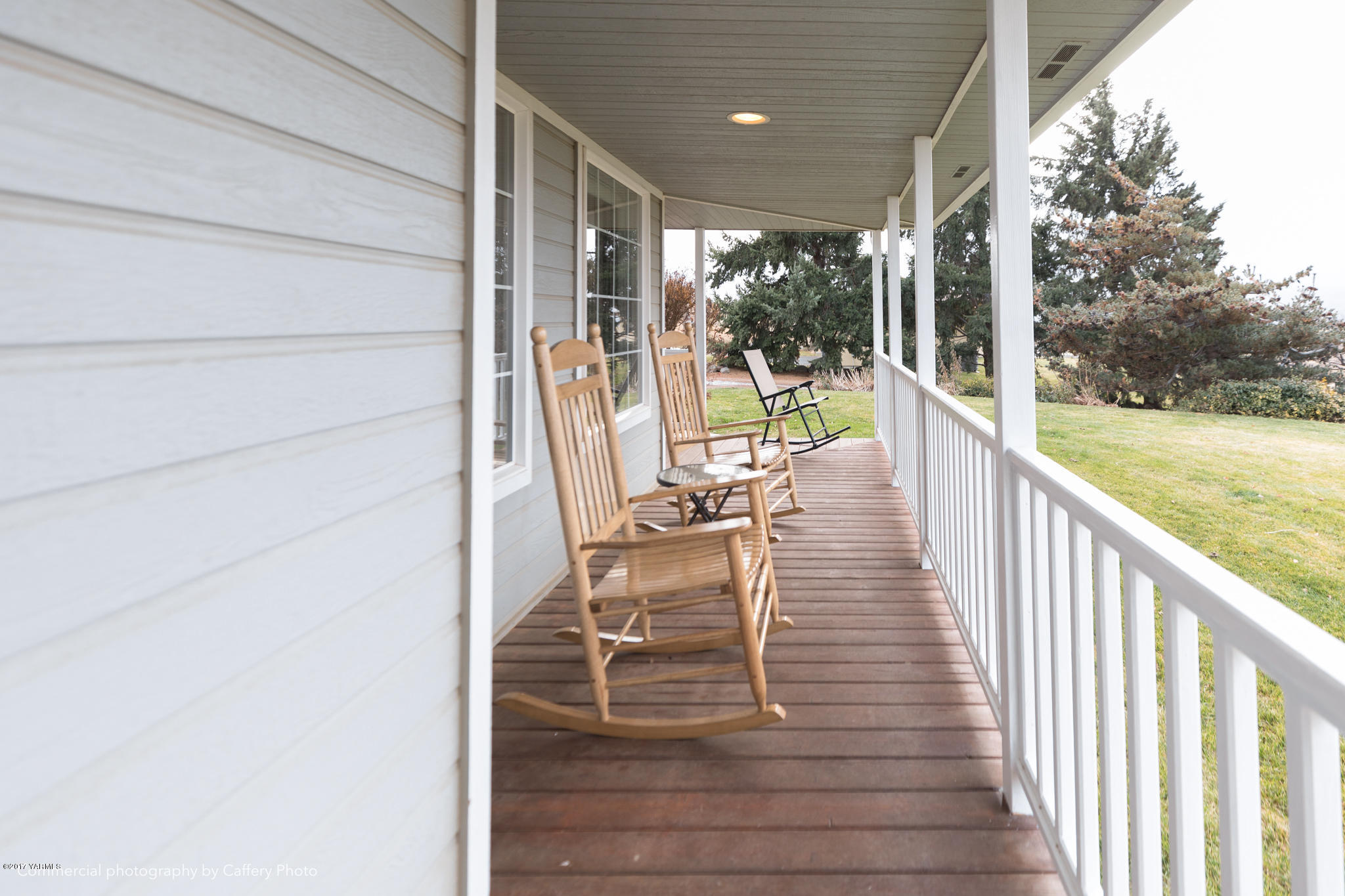 601 Hancock Road Cowiche, WA 98923 - Photo 21 of 28 a view of a balcony with floor to ceiling windows with wooden floor