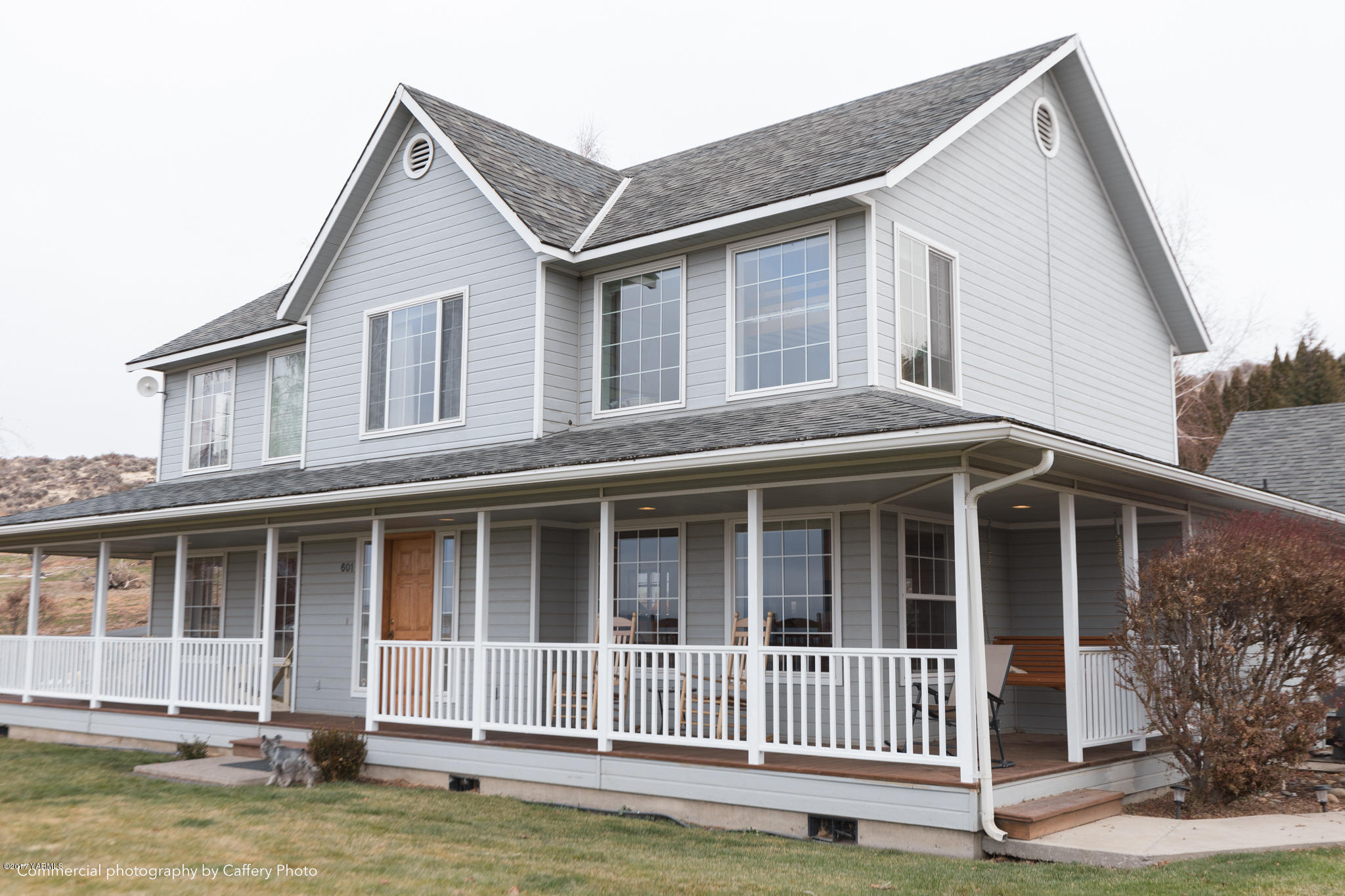601 Hancock Road Cowiche, WA 98923 - Photo 23 of 28 a front view of a house with a yard and porch