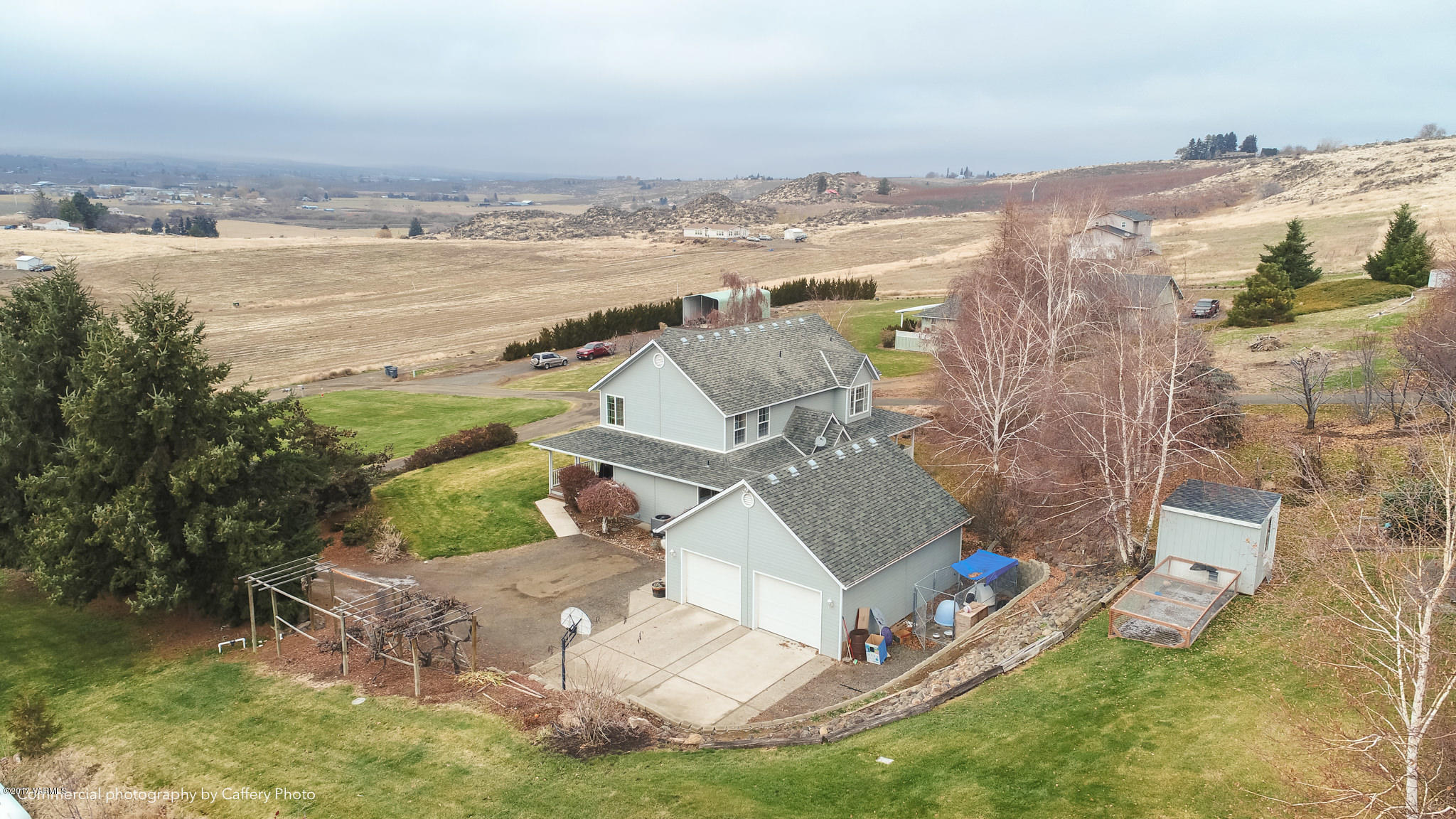 601 Hancock Road Cowiche, WA 98923 - Photo 26 of 28 an aerial view of residential houses with outdoor space
