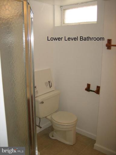 3918 Algiers Road Randallstown, MD 21133 - Photo 16 of 17 a bathroom with a toilet and a shower