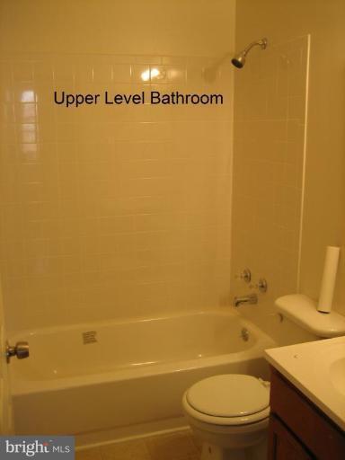 3918 Algiers Road Randallstown, MD 21133 - Photo 10 of 17 a bathroom with a toilet and a shower