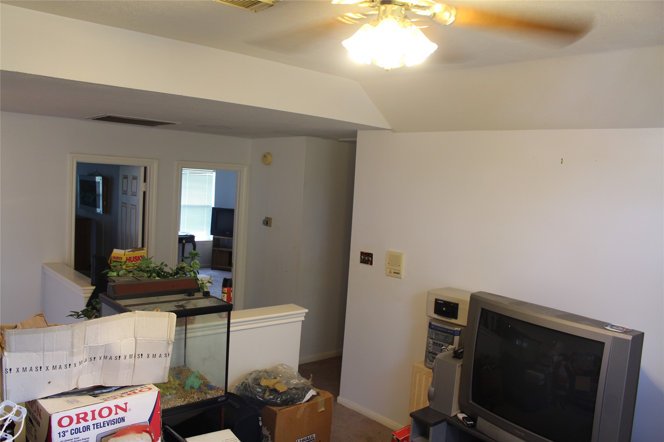 4103 Sablemist Court Houston, TX 77014 - Photo 17 of 29 a living room with furniture and a flat screen tv