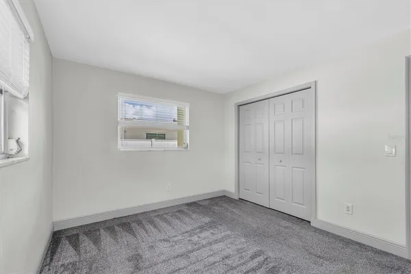 an empty room with a hallway